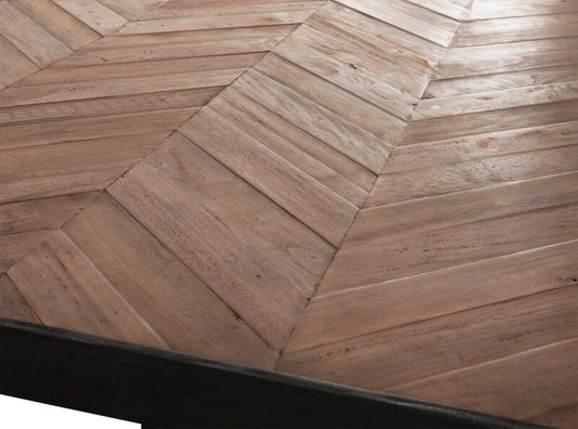Mesa de comedor rectangular con patas en forma de cruz.