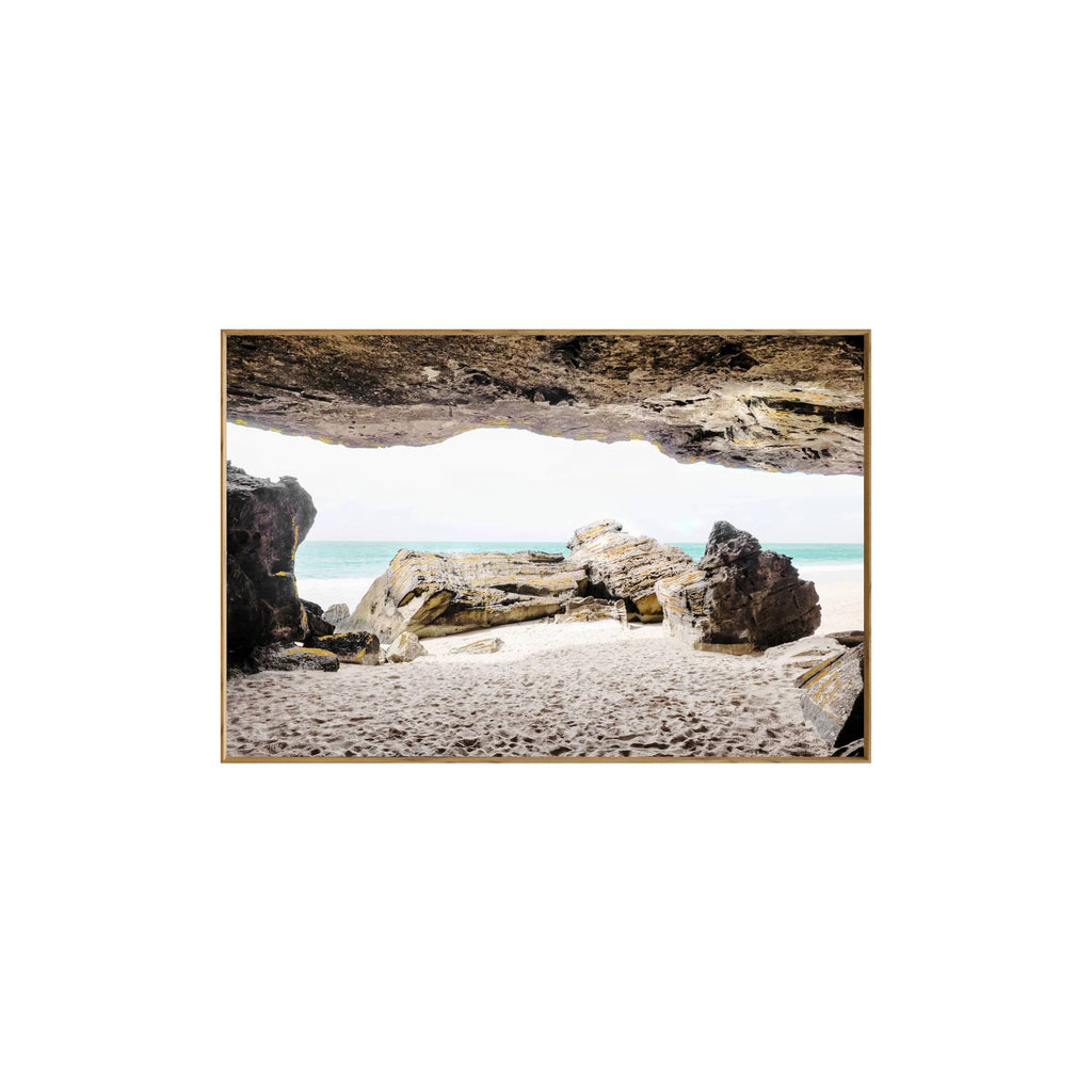 Cuadro de arte en vidrio de una cueva en la playa
