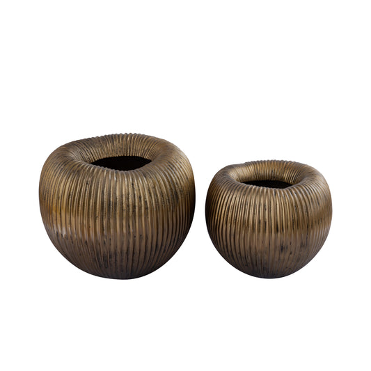 Russel Gold alu round pot low ribbed wide translates to "Only."