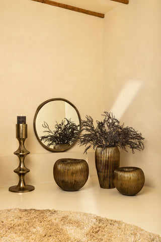 Russel Gold alu round pot low ribbed wide translates to "Only."