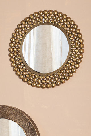 Zenno Oro espejo de pared redondo con borde punteado a Only.
